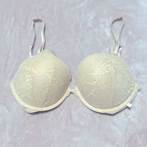 Victoria secret bra. Cream/beige with light pink accents.